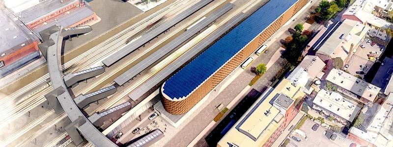 Nya stationstjänster för tågresenärer som avgår från och anländer till Åbo planeras redan till år 2025. Sunborn Group, som är moderbolag till Logomo Oy, planerar en femvånings stationsbyggnad på en tomt vid gatan Ratapihankatu bredvid Logomobron (till vänster i bilden). Samtidigt skulle företagen, besökarna och invånarna i Logomo och det nya utvecklande bangårdsområdet få mycket efterlängtade parkeringsplatser. Planeringsbild: Åbo Stad