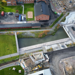 Parken består av tre delar, från vänster: gröna parkrummet, dagvattendammen och aktivitetsplatsen. Foto: Uppsala kommun
